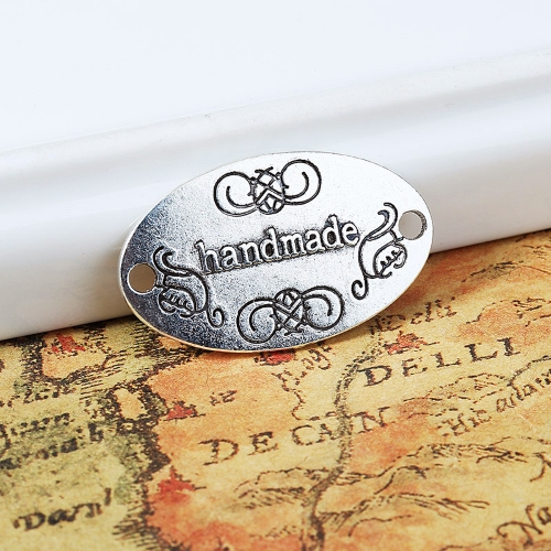 Oválek s nápisem handmade, přívěsek starostříbrný, kovový, 10 ks